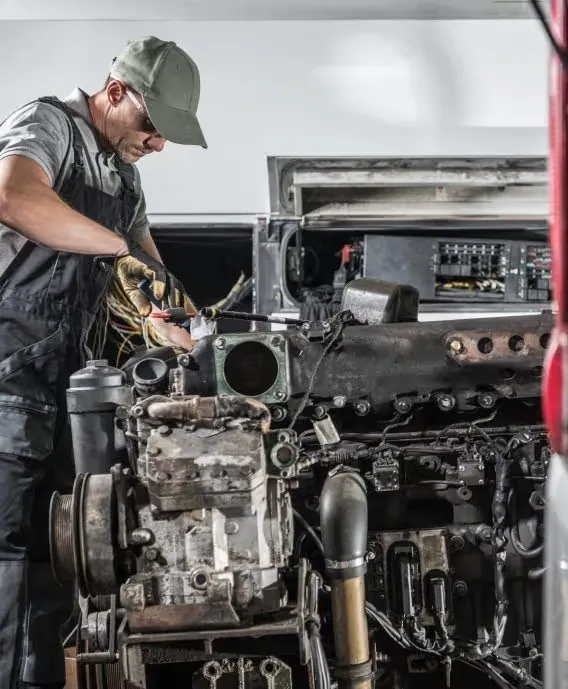 Technician working on a marine engine